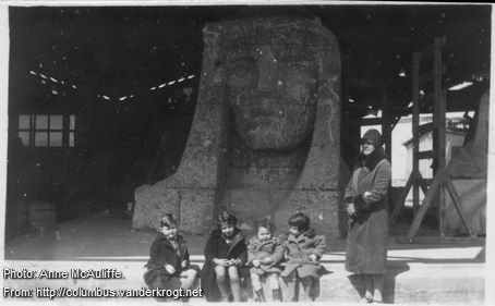 The McAuliffe children in front of the head of the statue, March 1929